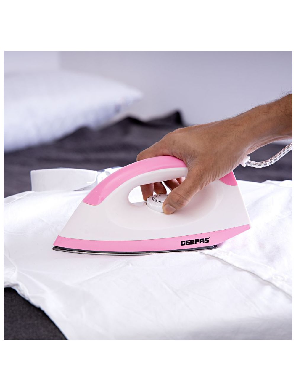 Geepas 1200W Dry Iron | reliable performance | lightweight | variable steam settings | safety features | stylish | even heat distribution | Halabh.com