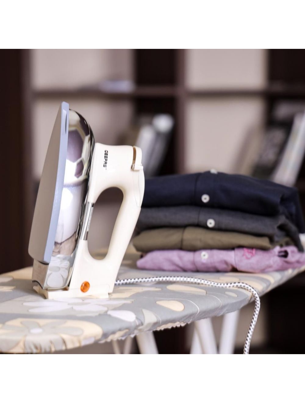 Geepas Dry Iron 1200W White | reliable performance | lightweight | variable steam settings | safety features | stylish | even heat distribution | Halabh.com